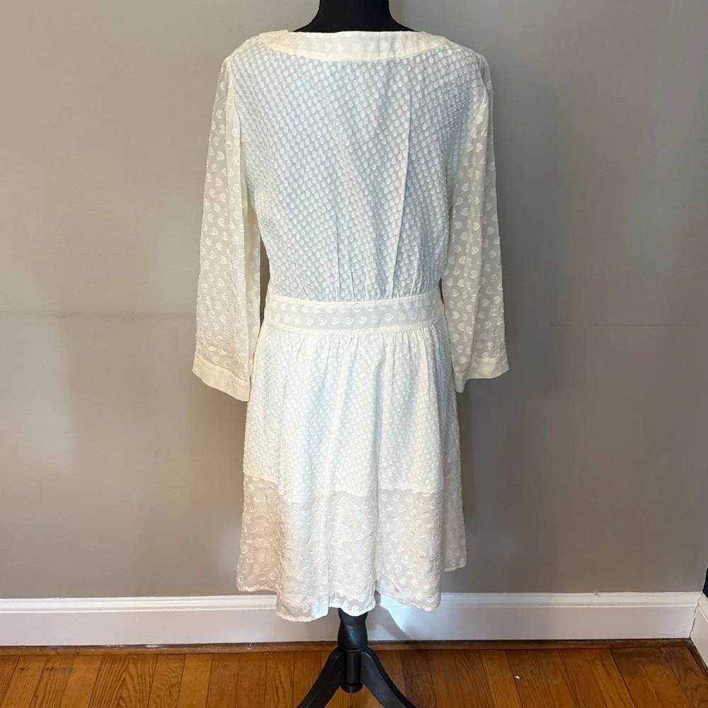 Tory Burch Ivory Swiss Dot Dress Size 8. Excellent condition. Side zipper .